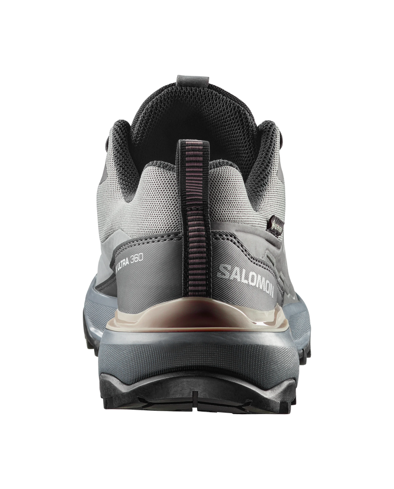 Gray Salomon hiking shoe on a white background
