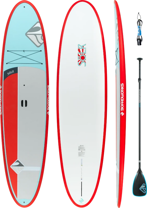 A light blue, red, and white paddleboard and a black paddle with blue details