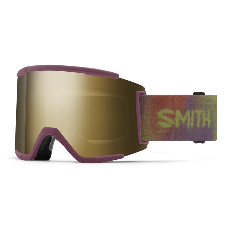 Gold ski goggles with a colorful Smith logo strap on a white background