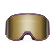 Gold goggles with purple frame on a white background