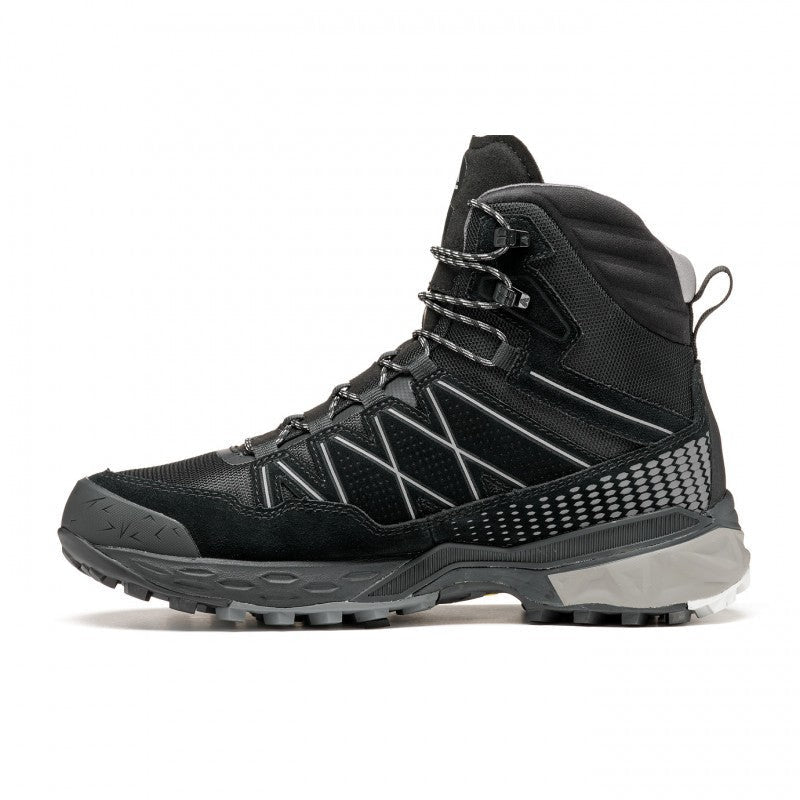 Side view of a black winter boot against a white background. 
