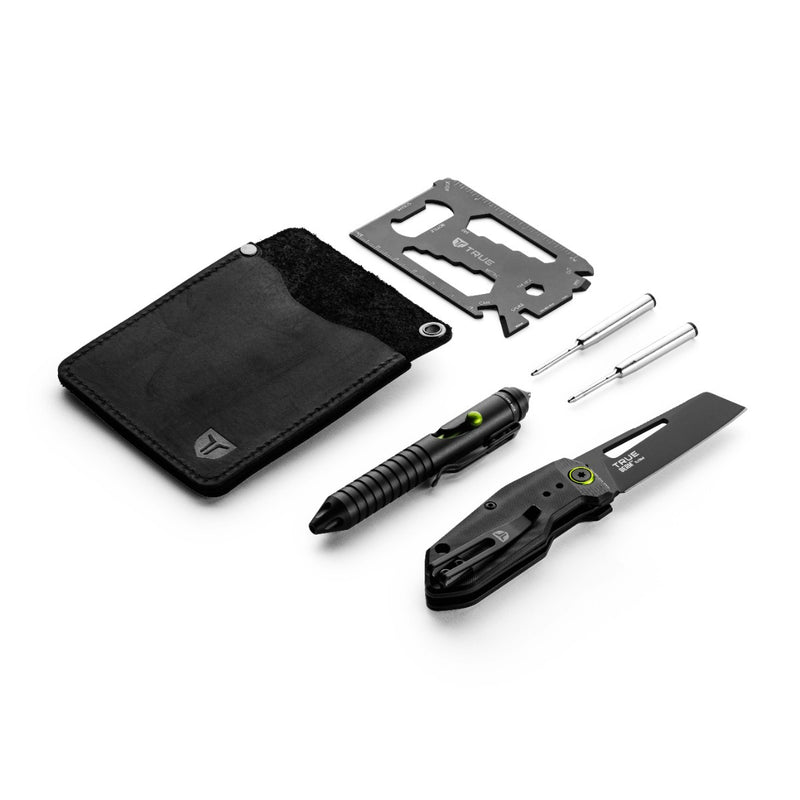 Pouch kit consisting of a black pocket knife, a mini screwdriver with two attachments, and a razorblade with a ruler on it against a white background.