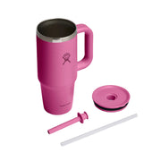 A pink Hydro Flask travel tumbler with a handle, shown with its lid, straw, and straw cap on a clean white background.