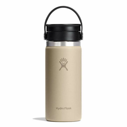 Beige Hydro Flask bottle with black lid on a white background