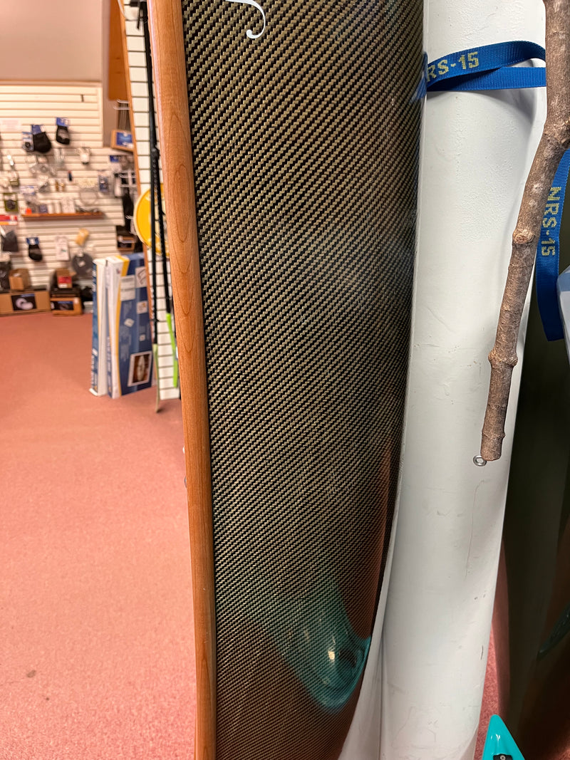 Exterior of the hull on a carbon-kevlar Slipsream Wee Lassie, close-up to show the exterior of a patched area. 