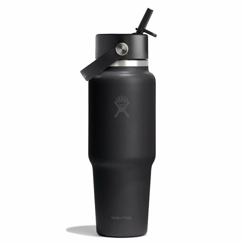 A matte black Hydro Flask insulated tumbler with a matching black lid and straw, featuring the brand's logo on the front, set against a plain white background.
