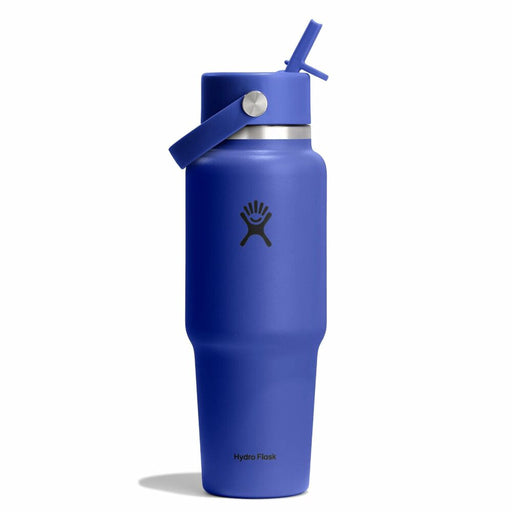Blue Hydro Flask water bottle with straw lid on a white background