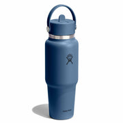 Blue water bottle with a silver cap on a white background